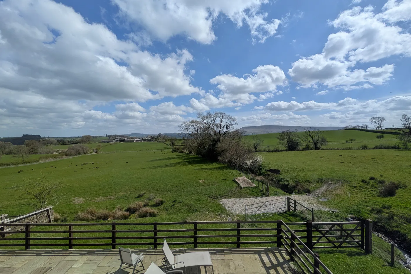 View across the terrace towards Pendle Hill at Hill Brook Barn
