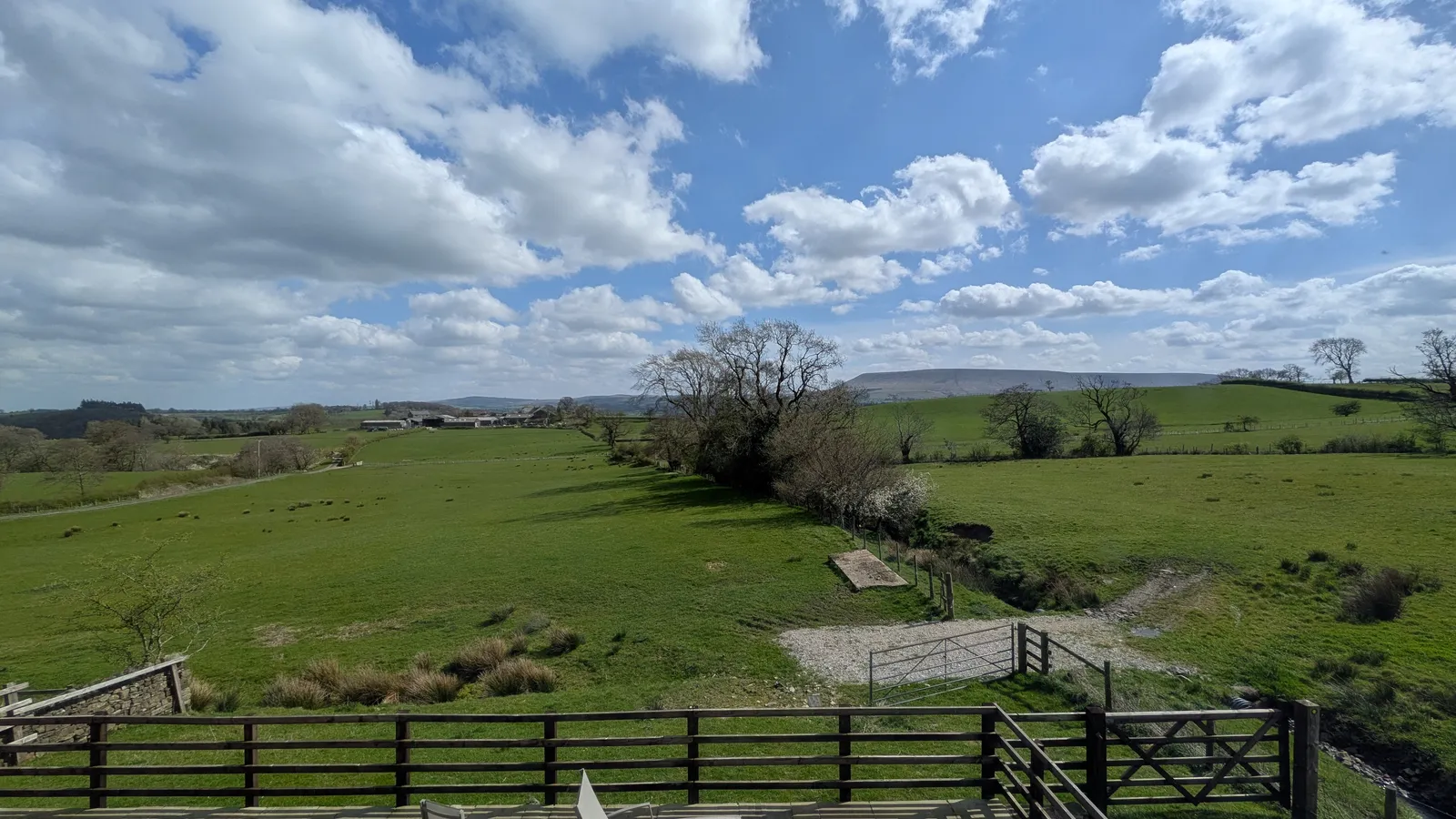 Stone terrace with views towards Pendle Hill at Hill Brook Barn