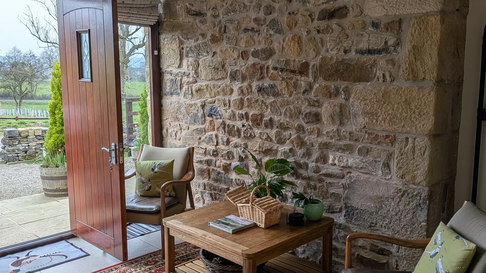 Entrance hall with original stone walls at Hill Brook Barn