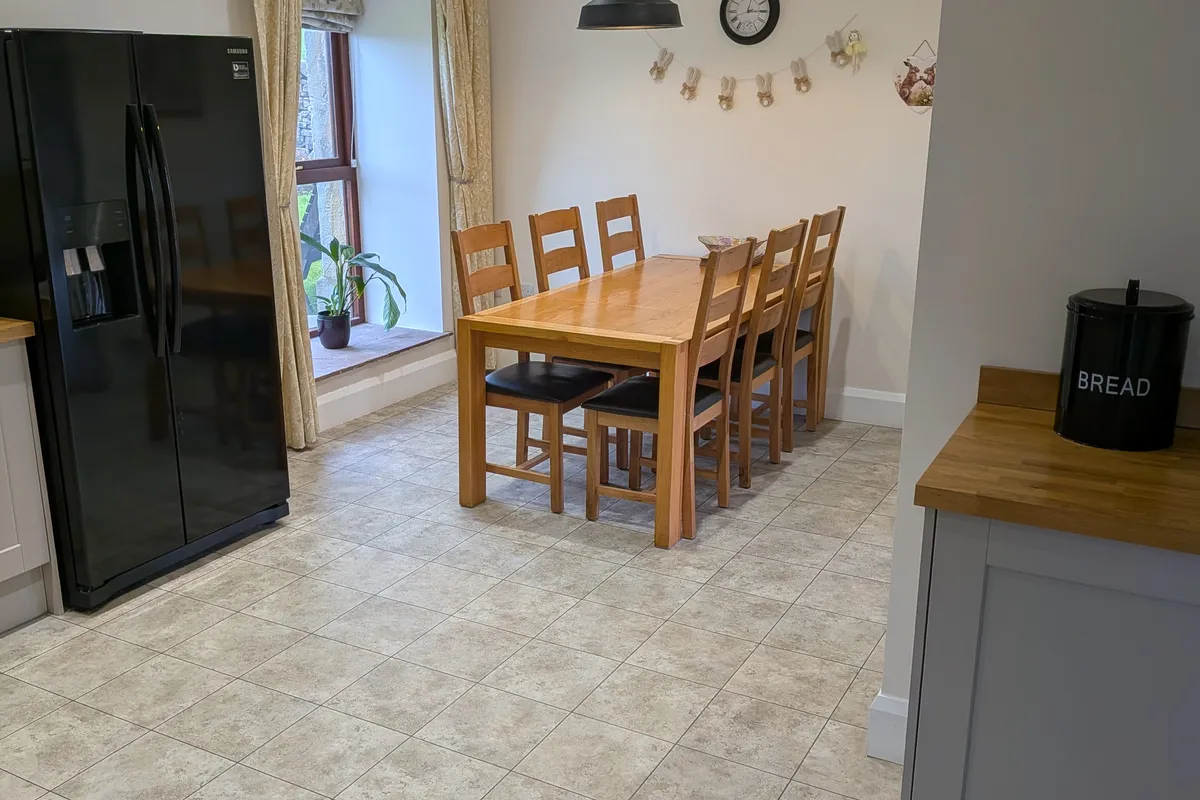 Dining area with oak table ideal for group gatherings