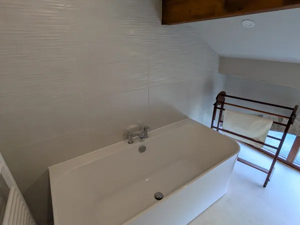 Master bathroom with freestanding bath at Hill Brook Barn