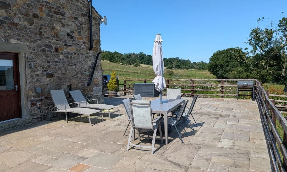 Outdoor dining set for six on the sunlit terrace