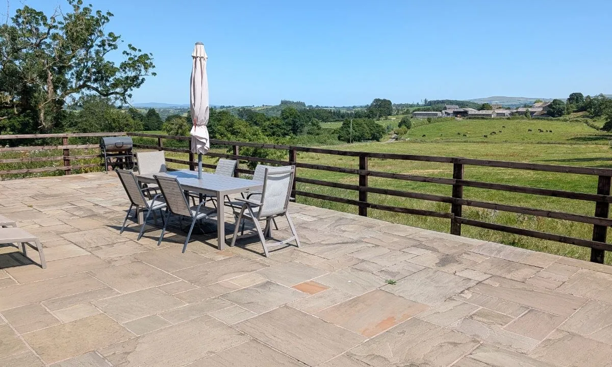 Al fresco dining on the terrace with Ribble Valley views beyond